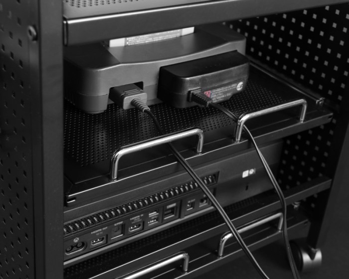 Console storage furniture with cable holes